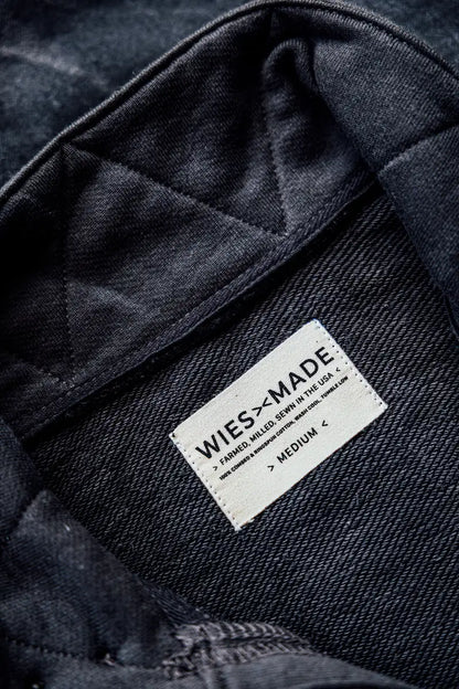 Inside quilted lining and cream WiesMade label on the basalt moto jacket, sewn in the USA.
