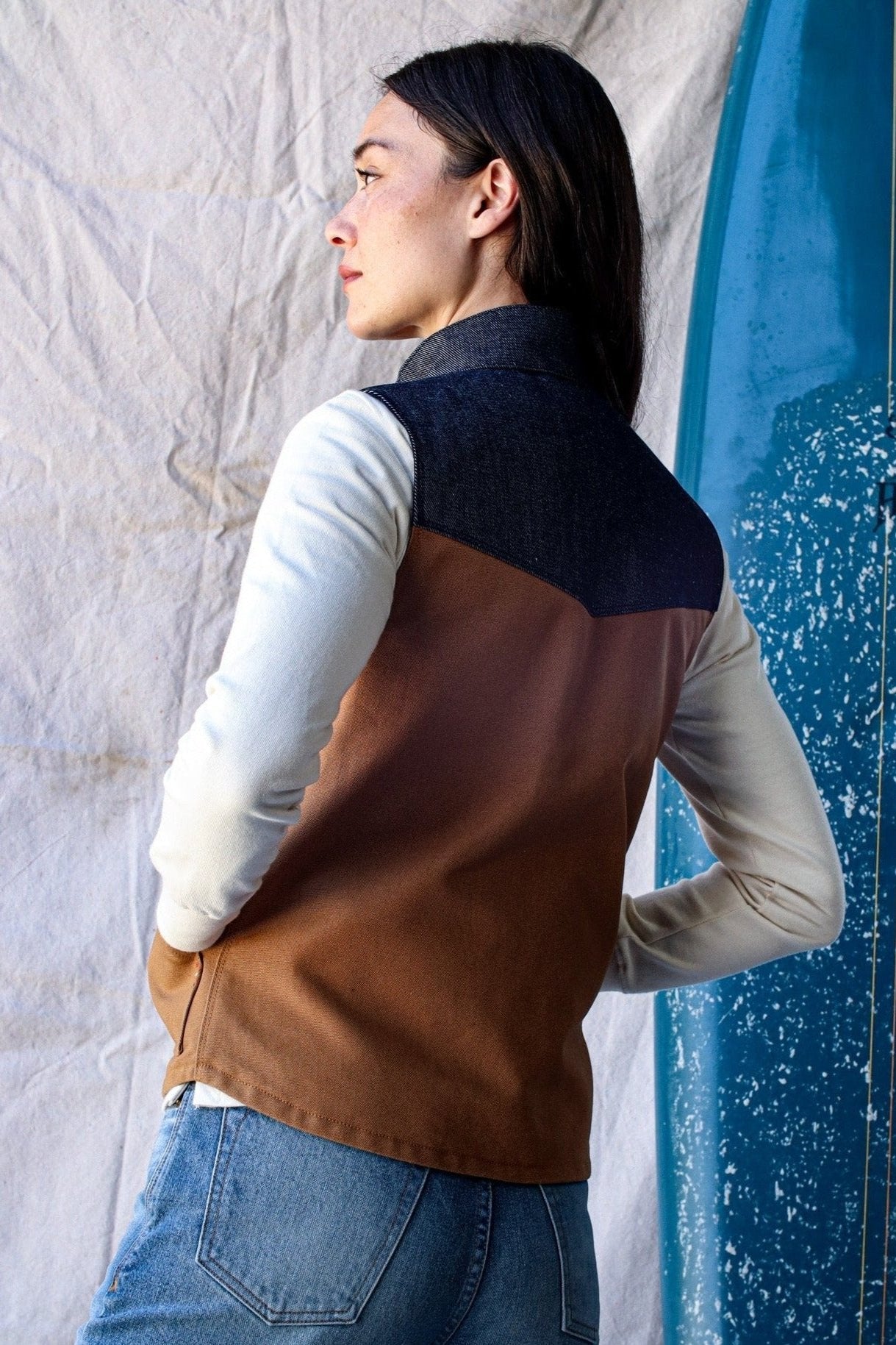 Back view of the Jamie wool-lined vest in brown canvas with denim yoke.