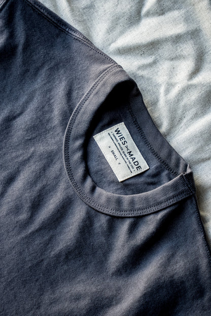 Close-up of Wies-Made men's pebble gray t-shirt neckline and label