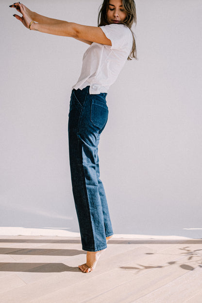 USA made ocean wash jeans for women shown from side view, featuring a straight leg fit, premium denim texture, and tailored seams for a refined, relaxed look