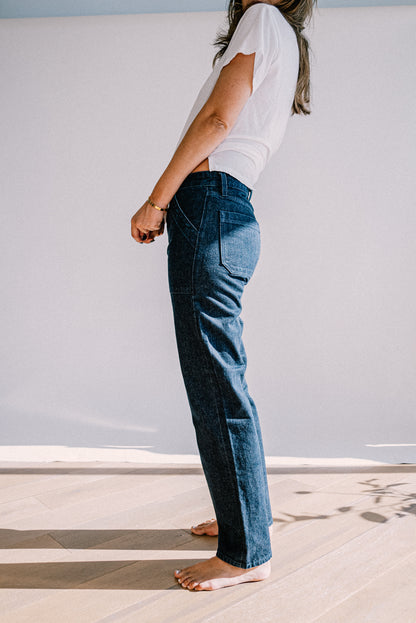 Premium ocean wash jeans for women shown from side view, featuring a relaxed straight leg fit, midweight denim, and clean tailored seams for a timeless casual style