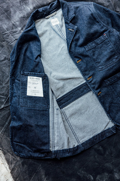 Scout denim chore blazer laid open to show interior pocket, raw selvedge seams, and size M label.