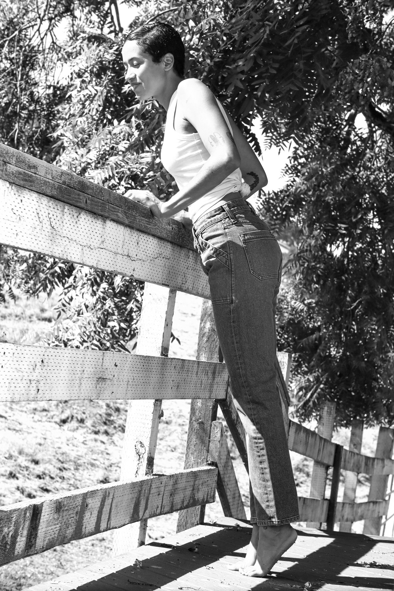 Women’s ocean wash designer jeans shown in black and white, featuring a high rise fit, straight leg silhouette, and tailored seams for a timeless, elevated casual look