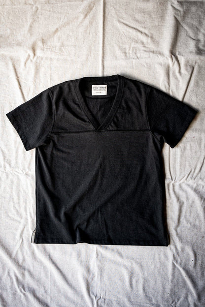 Women's Stinson basalt V-neck jersey tee in 12oz cotton, laid flat on linen.